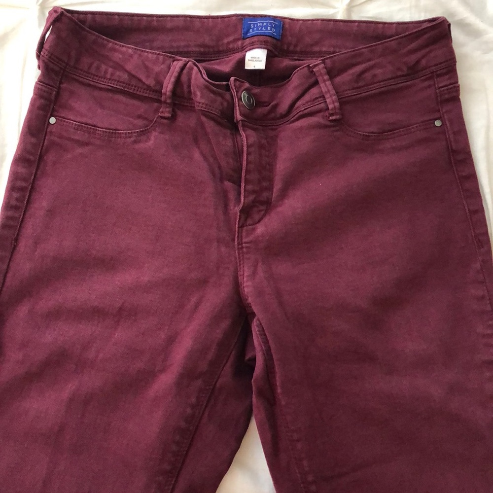 Dark burgundy skinny jeans